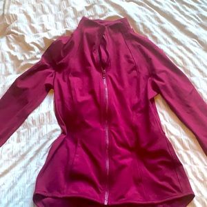 Red/maroon zip up athletic jacket